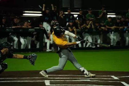 Nick Monistere swings at a pitch against Tulane