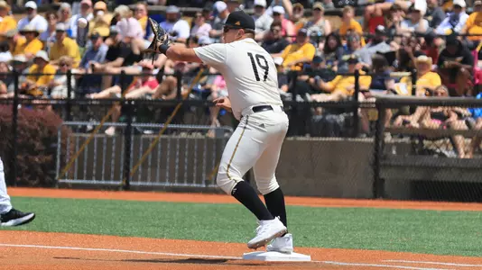 Southern Miss. infielder Matthew Russo (19) receives the ball at first base to record the out in a NCAA Baseball game between the Southern Miss Golden Eagles and the Coastal Carolina. May 4, 2024. (Joe Harper/bgnphoto.com)