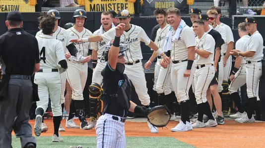 Southern Miss. infielder Ozzie Pratt (4) celebrates with his team after the home run in a NCAA Baseball game between the Southern Miss Golden Eagles and the Coastal Carolina. May 4, 2024. (Joe Harper/bgnphoto.com)