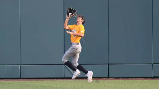 Southern Miss. pitcher Dalton McIntyre (14) makes a catch in deep center field in a NCAA Regional Baseball game between the Southern Miss Golden Eagles and the Tennessee Volunteers. June 2, 2024. (Joe Harper/bgnphoto.com)