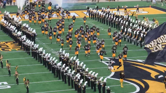 Team runs out on the field in a NCAA football game between the Southern Miss Golden Eagles and the South Florida Bulls. September 14, 2024. (Joe Harper/bgnphoto.com)
