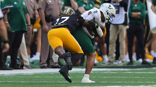 Southern Miss Golden Eagles linebacker Tre Pinkney (17) puts a hit on South Florida Bulls wide receiver Abdur-Rahmaan Yaseen (2) in a NCAA football game between the Southern Miss Golden Eagles and the South Florida Bulls. September 14, 2024. (Joe Harper/bgnphoto.com)