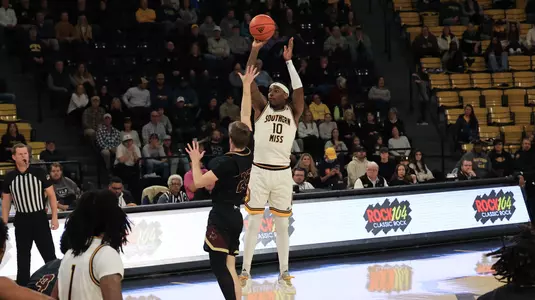 Southern Miss Golden Eagles guard Cobie Montgomery (10) with a three point shot In a game between the Southern Miss Golden Eagles and the Texas State Bobcats in a NCAA Men’s basketball game. January 10, 2025 (Joe Harper/bgnphoto.com)