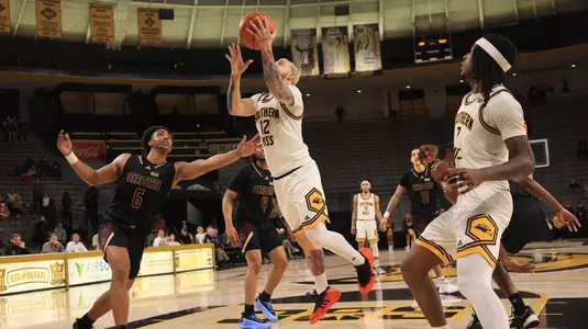 Southern Miss Golden Eagles guard Neftali Alvarez (12) goes in for a layup In a game between the Southern Miss Golden Eagles and the Texas State Bobcats in a NCAA Men’s basketball game. January 10, 2025 (Joe Harper/bgnphoto.com)