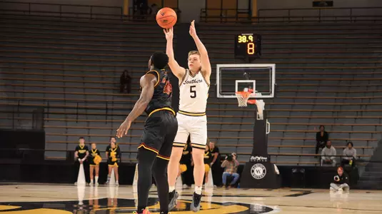 Southern Miss Golden Eagles guard Jett Montgomery (5) drains a three point shot In a game between the Southern Miss Golden Eagles and the Louisiana Monroe Warhawks in a NCAA Men’s basketball game. January 9, 2025 (Joe Harper/bgnphoto.com)