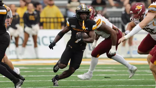 Southern Mississippi Golden Eagles wide receiver Elijah Metcalf (9) runs through a big hole)in a game between Southern Miss Golden Eagles and ULM Warhawks and in the NCAA Football game. October 25, 2025 (Joe Harper/bgnphoto.com)
