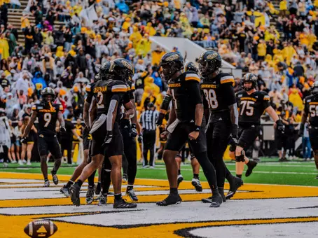 Braylon Braxton celebrates after a touchdown