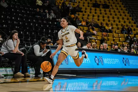 Meloney Thames (8) looks to attack the basket against Blue Mountain Christian