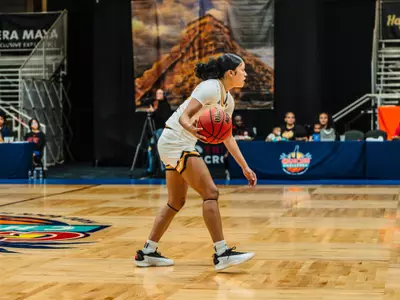 Meloney Thames with the ball against North Carolina State