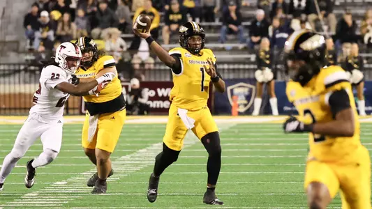 Southern Miss Golden Eagles quarterback Braylon Braxton (1) throws a pass in a game between Southern Miss Golden Eagles and Troy Trojans and in the NCAA Men’s Basketball game. November 29, 2025 (Joe Harper/bgnphoto.com)