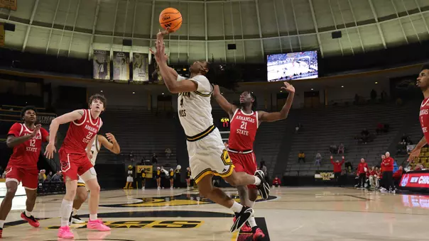 Southern Mississippi Golden Eagles forward Tylik Weeks (4) drives to the basket in a game between Southern Miss Golden Eagles and Arkansas State in a NCAA Men’s Basketball game. December 20, 2025 (Joe Harper/bgnphoto.com)