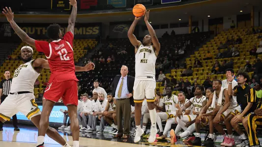 Southern Mississippi Golden Eagles guard Curt Lewis (1) takes a three point shot in a game between Southern Miss Golden Eagles and Arkansas State in a NCAA Men’s Basketball game. December 20, 2025 (Joe Harper/bgnphoto.com)