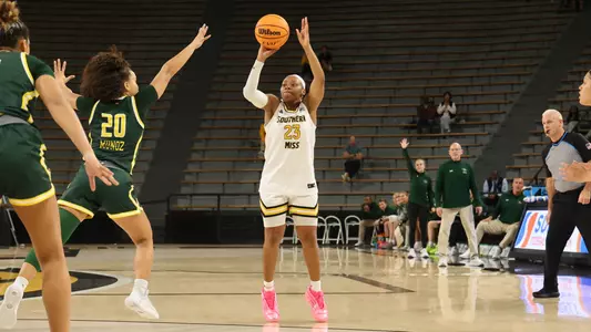 Southern Miss Lady Eagles guard Hayleigh Breland (23) takes a three point shot in a game between Southern Miss Golden Eagles and UAB Blazers and in the NCAA Women’s Basketball game. December 07, 2025 (Joe Harper/bgnphoto.com)