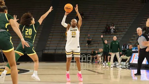 Southern Miss Lady Eagles guard Hayleigh Breland (23) takes a three point shot in a game between Southern Miss Golden Eagles and UAB Blazers and in the NCAA Women’s Basketball game. December 07, 2025 (Joe Harper/bgnphoto.com)