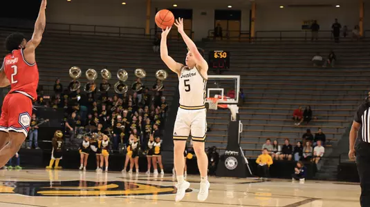 Southern Miss Golden Eagles guard Jett Montgomery (5) with a three point shot in a game between the Southern Miss Golden Eagles and South Alabama in a NCAA Mens basketball game. February 26, 2025 (Joe Harper/bgnphoto.com)