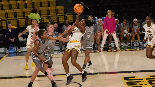 Southern Miss Lady Eagles guard Nyla Jean (14) takes a shot while being guarded by Georgia Southern Lady Eagles guard Nakiyah Mays-Prince (44) In a game between the Southern Miss Lady Eagles and the Georgia Southern Lady Eagles in a NCAA Women’s basketball game. February 05, 2025 (Joe Harper/bgnphoto.com)