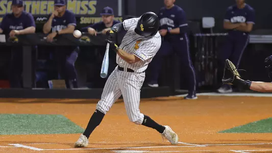 Southern Miss. infielder Ozzie Pratt (4) hits a home run in a game  between the Southern Miss Golden Eagles and Old Dominion in the NCAA  baseball game.  March 14, 2025 (Joe Harper/bgnphoto.com)