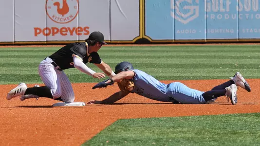 Southern Miss. pitcher Nick Monistere (8) tags Old Dominion outfielder Luke Waters (2) out at second base on a steal attempt in a game between the Southern Miss Golden Eagles and Old Dominion in the NCAA baseball game. March 16, 2025 (Joe Harper/bgnphoto.com)