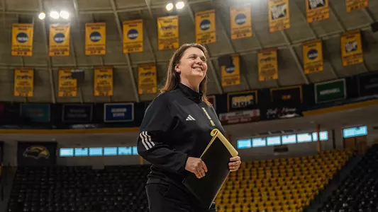 Missy Bilderback on the court at Reed Green Coliseum