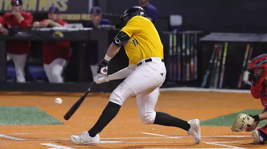 Southern Miss. infielder Davis Gillespie (11) flies out in foul territory in right field to drive in the winning run in the bottom of the 12th inning in a game  between the Southern Miss Golden Eagles and South Alabama in the NCAA  baseball game.  March 30, 2025 (Joe Harper/bgnphoto.com)