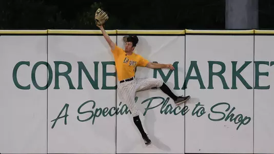 Southern Miss. outfielder Jake Cook (2) goes up against the wall to rob an Arkansas State home run in a game between the Southern Miss Golden Eagles and Arkansas State in the NCAA baseball game. May 3, 2025 (Joe Harper/bgnphoto.com)
