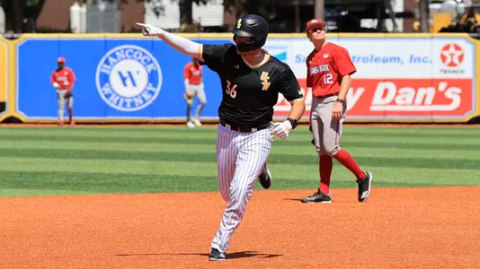 Southern Miss. catcher Tucker Stockman (36) points to the bullpen after the home run in a game between the Southern Miss Golden Eagles and Arkansas State in the NCAA baseball game. May 4, 2025 (Joe Harper/bgnphoto.com)