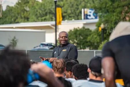 Charles Huff addressing team