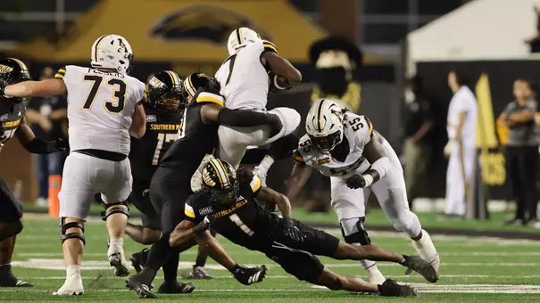 Southern Miss Golden Eagles cornerback Josh Moten (1) makes a tackle In a game between Southern Miss and App State and in the NCAA Football game. September 12, 2025 (Joe Harper/bgnphoto.com)