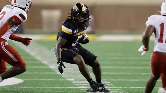 Southern Miss Golden Eagles running back Matt Jones (5) looks for an opening In a game between Southern Miss and Jacksonville  State and  in the NCAA  Football game.  September 27, 2025 (Joe Harper/bgnphoto.com)