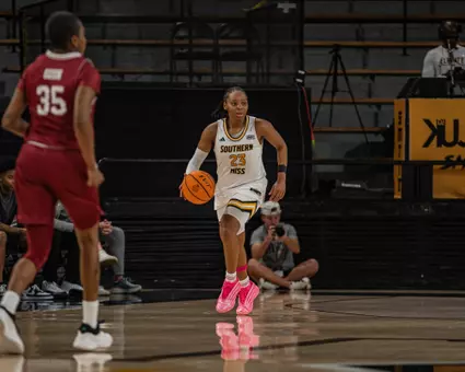 Hayleigh Breland moves the ball against Troy