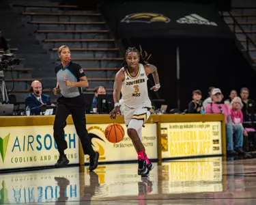 Jakayla Johnson looks to attack against Troy