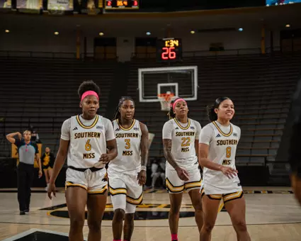 Brikayla Gray, Jakayla Johnson, Sakyia White and Meloney Thames leave the floor