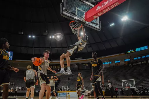 Brandon Weston dunks during the Black and Gold Scrimmage