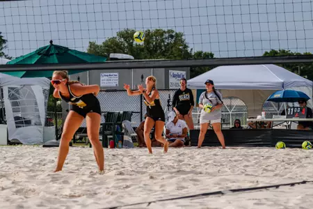 Laurel Dennis and Sadie McAda ready for a dual in the 2025 SBC Tournament