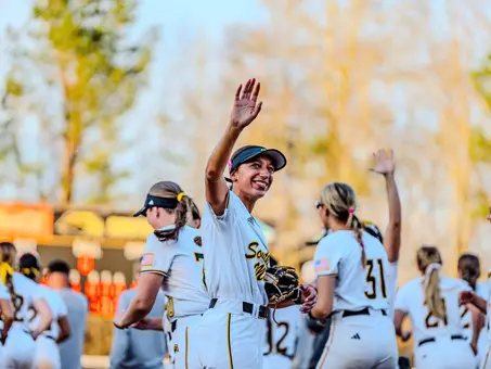 Madison Johnson waving to fans