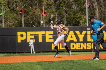 Davis Gillespie rounds the bases after his Homerun