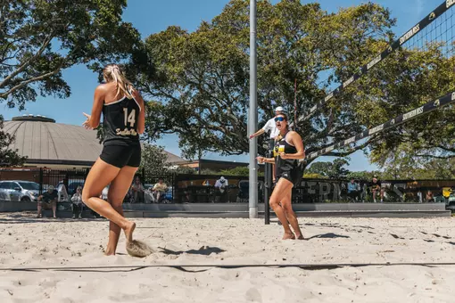 Abby Lewis (14), left, and Zuzanna Michalska (1), right, celebrate at the Spring Break Slam