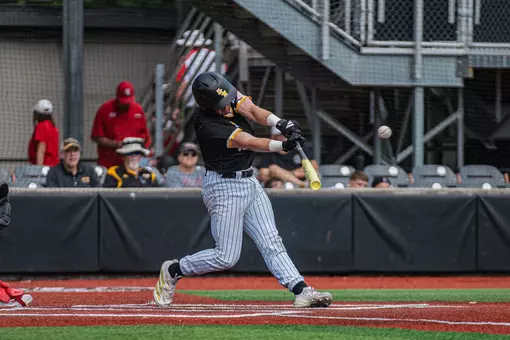 Lawsom Odom makes contact as he registers a hit