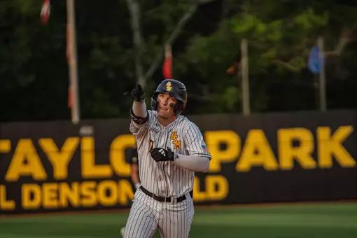 Ben Higdon celebrates his homerun