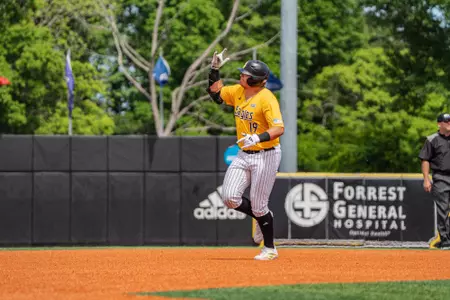Matthew Russo rounds the bases after his homerun