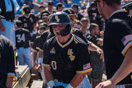 Lawson Odom celebrates his first career homerun
