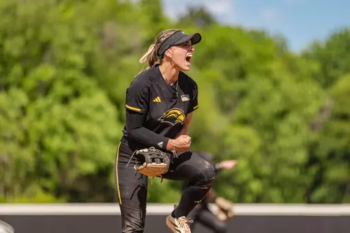 Abbi Troquille celebrating an out
