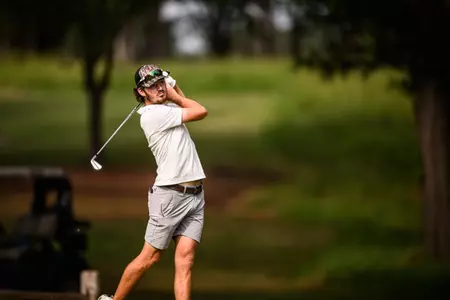 Jake Moffitt hitting an iron at the SBC Championship