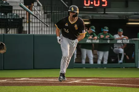 Tucker Stockman heads to first after he gets walked