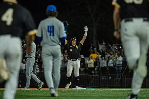 Matthew Russo celebrates his walk off hit vs. UNO
