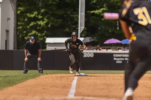 Abbi Troquille on third base