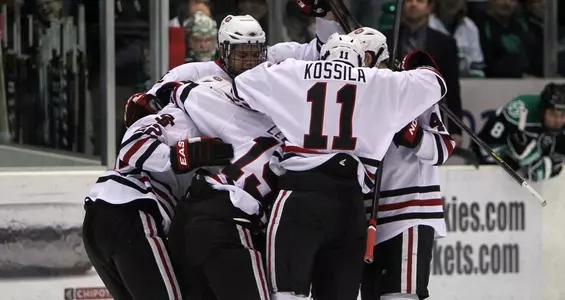 Jarrod Rabey and Kalle Kossila Group Hug