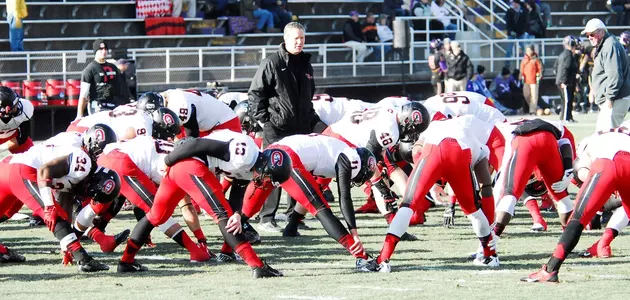 Scott Underwood.team huddle.MSU.11.30.13