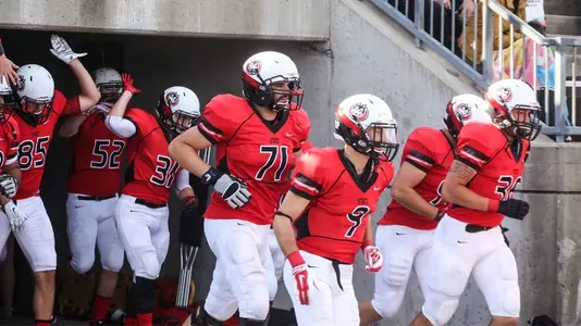Huskies football enters stadiium