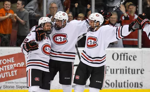 Jack Ahcan, Ryan Poehling and Judd Peterson